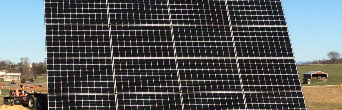 Singular solar panel in a field