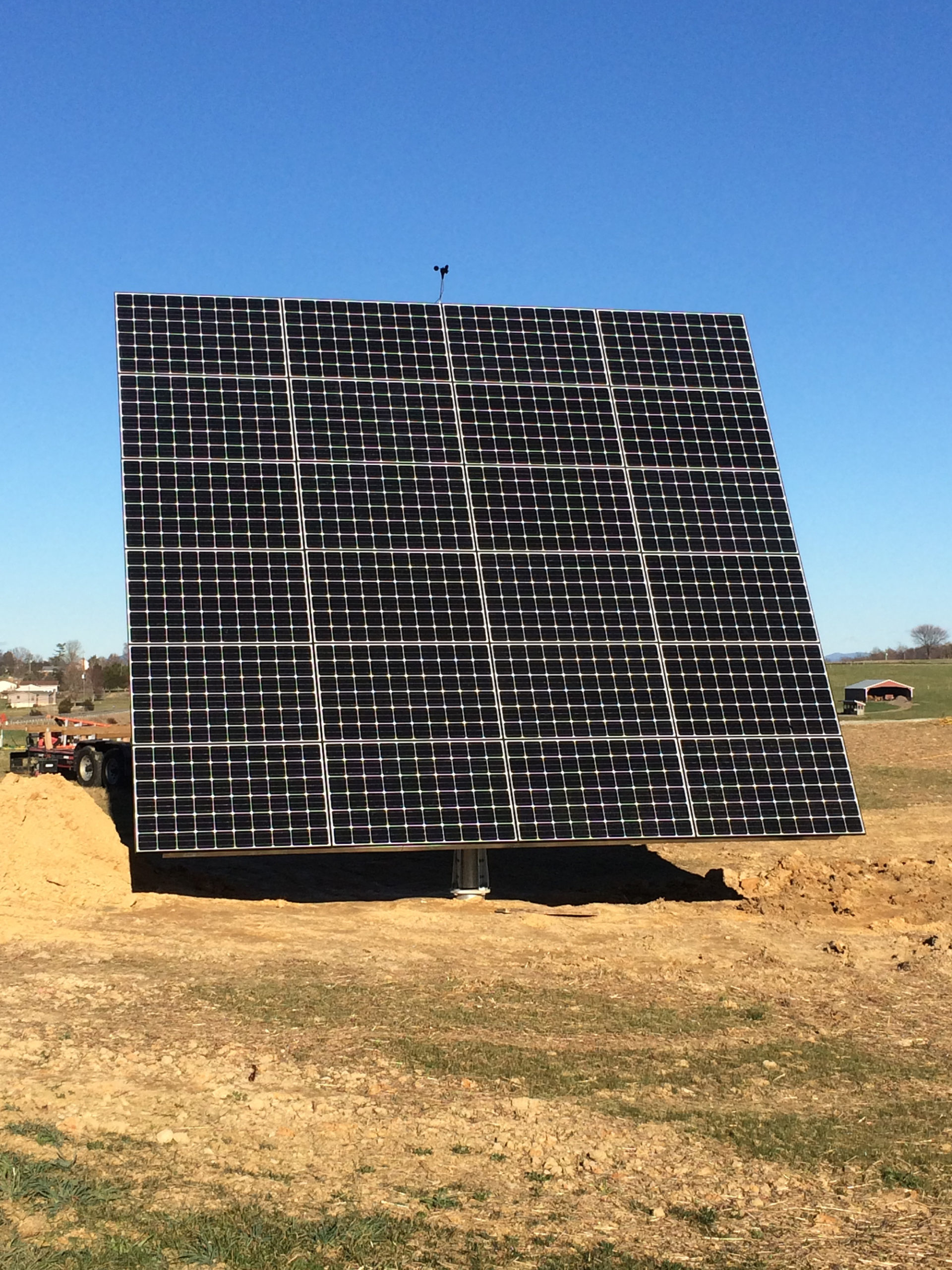 Singular solar panel in a field