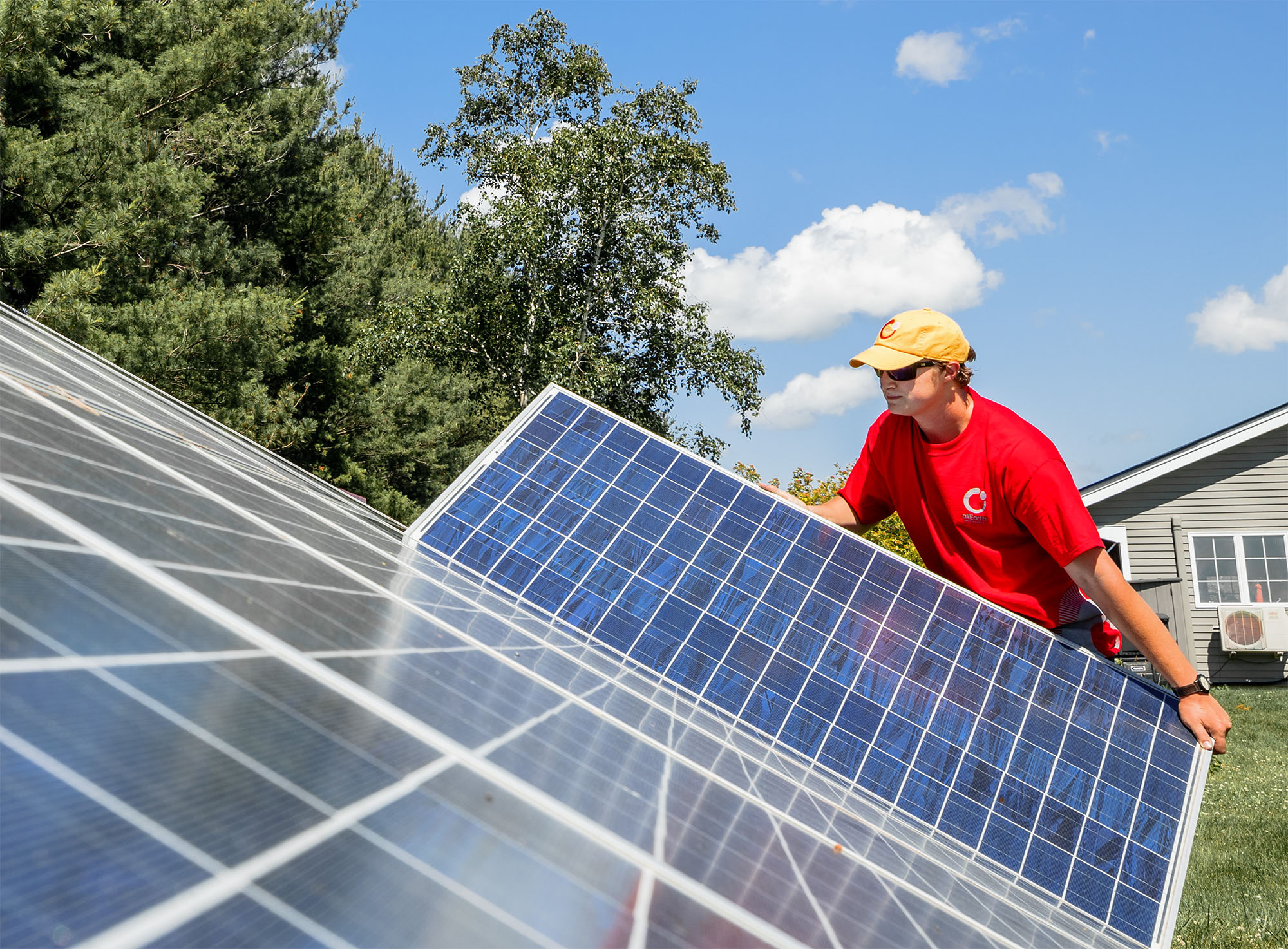 2 men installing a solar panel